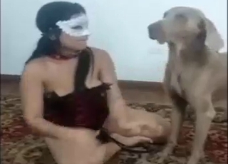 Brunette with a round booty fucking her pet